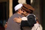 hugging Afghans